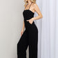 White Birch Full Size Halter Neck Wide Leg Jumpsuit with Pockets